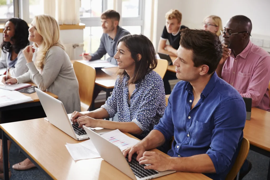 education staff sitting in staff training session